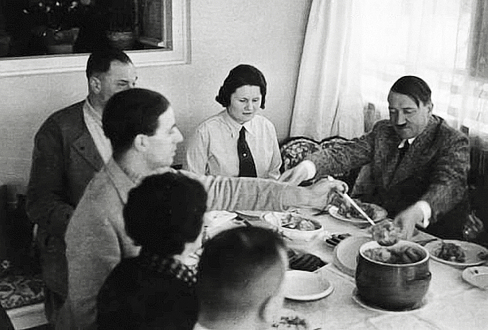 Adolf Hitler sharing Eintopf with Julius Schaub, Sophie Stork, Karl Brandt, Wilhelm Brueckner, Erna Hoffmann